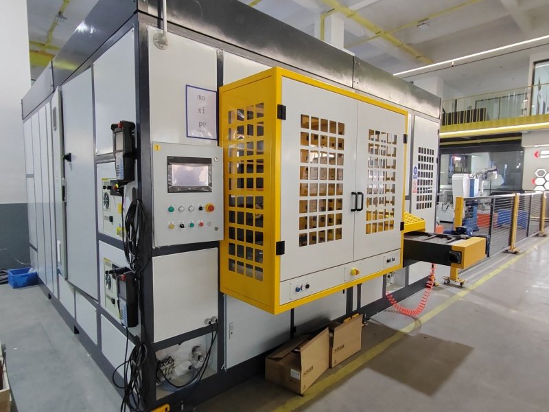 robotic polishing cell with dust collection and safety enclosure