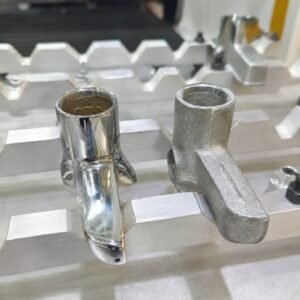 Zinc alloy faucet parts before and after robotic polishing